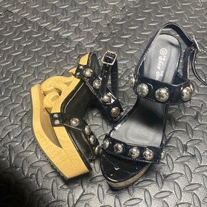 Size 6 studded wooden sandals